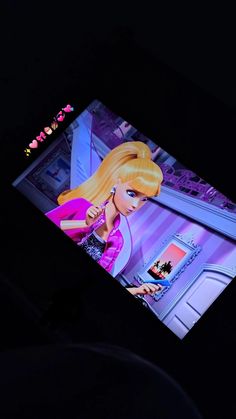 there is a barbie doll on the tv screen