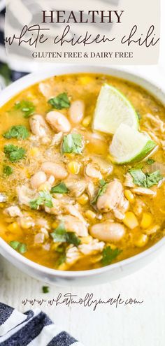 a white bowl filled with chicken and tortilla soup, topped with cilantro