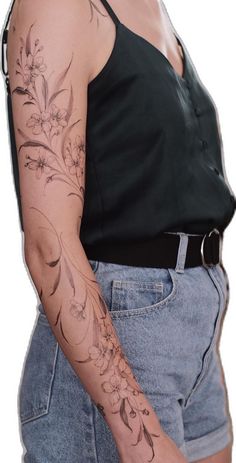 a woman with a tattoo on her arm