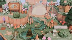 an animated image of a small town with lots of trees and flowers on the ground