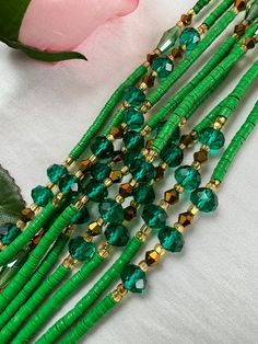 Stunning African waist beads in a mix of green vinyl and seed beads. Easy to self fit by tying on. 46 inches long. Handmade in Ghana. Handmade Green Waist Beads, Green Waistbeads, Luxury Hand-strung Green Beads, Bohemian Hand-strung Green Beads, African Waist Beads, Green Vinyl, Hand-strung Green Jade Beads, Diy Furniture Easy, Waist Beads