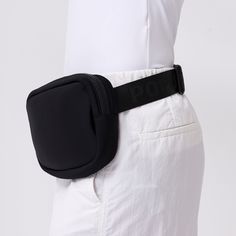 The Everyday Fanny Pack: the perfect hands-free, on the go essential. With zip pockets inside and out, a mesh compartment, an adjustable waist strap for easy fastening or shoulder wear, and sleek neoprene material that makes it machine washable, this fanny pack is a closet staple. Stay organized, hands-free, and ready for anything with this stylish fanny pack. Black Nylon Belt Bag For Sports, Sporty Black Belt Bag With Zipper Pocket, Sporty Black Belt Bag For Outdoor Activities, Practical Black Nylon Belt Bag, Sporty Black Belt Bag With Cell Phone Pocket, Black Nylon Belt Bag With Zipper Pocket, Sporty Black Belt Bag With Zipper Closure, Black Nylon Belt Bag With Pockets, Black Nylon Belt Bag With Zipper