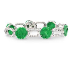 Six brilliant green jade stones are set in this Art Deco bracelet. Composed of geometric motifs popular in the period, the circular jade specimens are set between octagonal links inset with diamonds. The vibrant green color of the stones is beautifully complemented by white diamonds totaling approximately 4.50 carats. Set in platinum. 7 1/2" length Modern Sapphire Ring, Golconda Diamond, Rare Pearls, Rare Diamond, Bracelets For Sale, Designer Bracelets, Yellow Gold Bangle, Art Deco Bracelet, Antique Bracelets