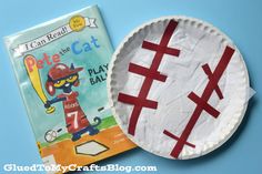 a paper plate with an image of pete the cat on it next to a children's book