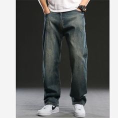 For a youthful stylish appeal, invest in these hip-hop-styled straight jeans for men that are designed in a solid pattern using denim material. These bottoms which have a mid-weight thickness are plus-sized and loose-fitting. They are full-length spring and autumn jeans with a button-fly closure and decorative pockets.Specifications Wash: Light Waist Type: MID Thickness: Midweight Style: HIP HOP Place Of Origin: China (Mainland) Pattern Type: Solid Origin: Mainland China Model Number: 2022/YD145 Hip Hop Style Straight Leg Dark Wash Jeans, Hip Hop Straight Leg Jeans With Five Pockets, Hip Hop Style Straight Leg Jeans With Five Pockets, Hip Hop Style Dark Wash Straight Leg Jeans, Hip Hop Dark Wash Straight Leg Jeans, Hip Hop Straight Leg Denim Blue Jeans, Hip Hop Style Straight Leg Denim Blue Jeans, Hip Hop Straight Leg Medium Wash Jeans, Hip Hop Straight Leg Jeans In Medium Wash