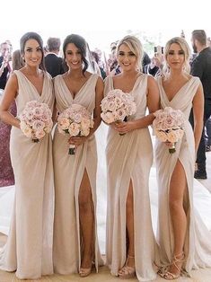 the bridesmaids are all dressed in different styles of gowns and bouquets