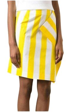 White and yellow cotton blend side flap striped skirt from Jacquemus. Bold stripesHidden side zipLined.Fabric: Mid-weight weave. 97% cotton, 3% elastane.Wash cold.Made in France. Size FR34 Waist 3" Hips 36" Length 26.75" ​Size FR36 Waist 30" Hips 34" Length 26" Striped Skirt, Bold Stripes, Maxi Knit Dress, Skirts Online, Ribbed Knit Sweater, Stripe Skirt, Side Stripe, Skirt Pants, Cotton Dresses