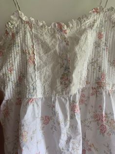 This is a super cute shortie babydoll nightgown by Victoria's Secret vintage 1990's.  Tagged size medium Floral all over white cotton. Bodice trimmed in sweet ruffles and ecru color eyelet lace. Just really adorable. Ruffle hem. Straps do not adjust! Bust flat is 17 inches. No stretch Length is roughly 32 inches  Strap drop is roughly 7 inches.  No issues but may be faded from laundry and wear.   Used garment. Sold as is. Final sale. No returns. 🌺🌺 Cottagecore Cotton Nightgown For Bedtime, Cottagecore White Sleepwear With Lace Trim, White Cottagecore Sleepwear With Lace Trim, Cottagecore Cotton Nightgown With Lace Trim, Cottagecore Cotton Sleepwear With Lace Trim, Coquette Ruffled Sleepwear For Bedtime, Coquette Ruffled Sleepwear, Coquette Spring Sleepwear With Lace Trim, Cute Lace Trim Sleepwear