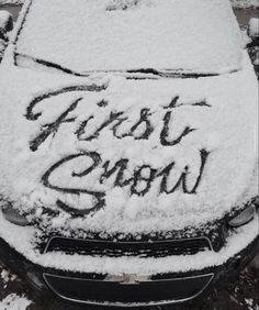 a car covered in snow with the words frost storm written on it's hood