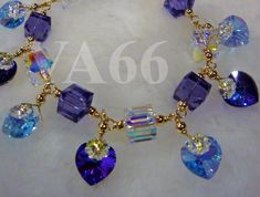 "Custom made to your order Color of crystals Cube and heart Material 14k gold or 925 sterling silver Length of bracelet This listing is for Blue n Purple 14K Gold Filled Swarovski Crystal Cube Love Charm Bracelet 24 Color Choices 925 Silver choice, Bridesmaids, MOB, Gift, Prom 24 Colour Choices, LET me know your COLOUR CHOICE  you are buying only 1 Bracelet, choose 1 out of  the Ready Colours shown or MIX and Match Custom make your bracelet to Colours of your choice and let me know which one you Mob Gift, Swarovski Pearls Bracelet, Crystal Anklet, Crystal Jewellery, Love Charms, Swarovski Jewelry, 925 Silver Jewelry, Swarovski Pearls, Sterling Silver Charm