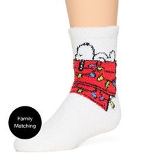 Keep your kid's feet in the festive spirit with this pair of Peanuts Snoopy themed slipper socks. Made from a soft stretchy knit, this unisex pair of crew slipper socks comes complete with a holiday Snoopy graphic and non-slip grips for added support. Team them with a Snoopy pajama set to complete the look.# Pieces In Set: 1 PairFeatures: Non-Slip GripCharacter: Peanuts, SnoopyShoe Size Range: 5-10Fiber Content: 100% PolyesterFabric Description: KnitCare: Tumble Dry, Machine WashCountry of Origi Holiday Snoopy, Snoopy Pajamas, Kids Slippers, Slipper Socks, Peanuts Snoopy, Support Team, A Holiday, Pajama Set, Peanut