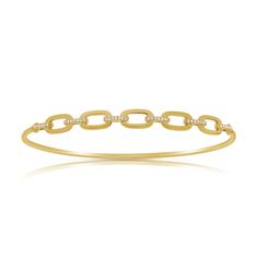 Enhance your elegance with the 14K Gold Designer Links Diamond Bangle. This exquisite piece is crafted from luxurious 14K gold and features a unique design of interlocking links. Each link is adorned with sparkling diamonds, totaling 0.14 carats, adding a touch of brilliance and sophistication to the bracelet. The intricate design and radiant diamonds make this bangle a standout accessory for both everyday wear and special occasions. With a secure clasp and a comfortable fit, this diamond bangle Diamond Link Bracelet In Yellow Gold, Luxury Link Diamond Bracelet With Diamond Accents, Modern Yellow Gold Diamond Bracelet With Adjustable Chain, Luxury Link Diamond Bracelet With Accents, Yellow Gold Link Bracelets With Diamonds, Anniversary Diamond Bracelet With Rectangular Links, Diamond Link Bracelet In Fine Jewelry Style, Fine Jewelry Diamond Link Bracelet, Gold Diamond Bracelet With Adjustable Chain