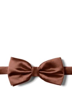 Suit up to perfection with the beautiful solid pre-tied bow tie by Peter Hayer. This microfiber spice brown pre-tied bow tie features a refined satin finish, giving just the right amount of sheen that's perfect for formal events, important business meetings, or weddings. This durable bow tie is never short on style and you'll be receiving compliments for years to come. Imported. Elegant Brown Bow Ties, Pre-tied Solid Color Satin Bow Tie, Classic Brown Bow Tie, Elegant Brown Satin Bow Tie, Brown Formal Suit And Bow Tie Accessories, Elegant Brown Suit And Tie Accessories With Bow Tie, Elegant Brown Bow Tie Suit Accessories, Elegant Brown Party Ties, Elegant Brown Bow Tie With Satin Bow