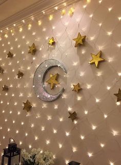 the wall is decorated with stars and a crescent