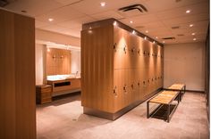 the lockers are lined up against the wall in the room with no one inside