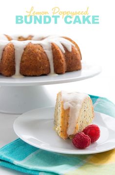 a bundt cake with white icing and fresh raspberries on the side