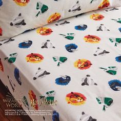 an image of a bed sheet with animals on it