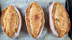 three pieces of bread sitting on top of a pan