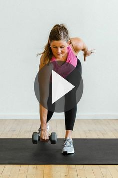 a woman is doing an exercise with dumbbells