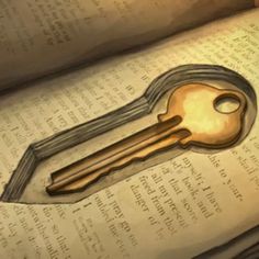 a golden key on top of an open book