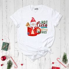 Hot Cocoa and Christmas Movies Shirt, Christmas Movies T-Shirt, Cute Holiday Shirt, Hot Cocoa T-Shirt, Movie T-shirt, Santa Hot Coffee Shirt. Family Christmas 2022 Shirt: https://etsy.me/3S3wMhS Christmas Lights Shirt: https://etsy.me/3S4ZcrI Funny Christmas Shirt: https://etsy.me/3EOOMJJ Christmas Crew Shirt: https://etsy.me/3S6jSj8 Most Likely To Christmas Shirt: https://etsy.me/3CELXYY Hot Cocoa and Christmas Movies Shirt are Bella+Canvas branded. I will ship it from a trusted brand of the sa Christmas Movie Shirts, Coffee Shirt, Funny Christmas Shirts, Holiday Shirt, Movie Shirts, Coffee Shirts, Movie T Shirts, Crew Shirt, Holiday Shirts