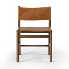 a wooden chair with leather seat and backrests on an isolated white background photo