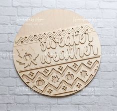 a wooden plaque with the words, love is in the air and hearts on it