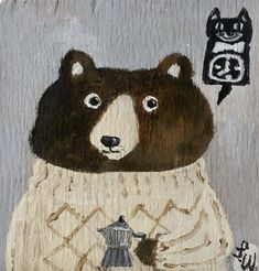 a drawing of a bear wearing a sweater with a cat on it's back