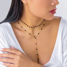 A standout choker and lariat duo featuring a series of small black beads along 18k gold-plated chains. Choker : 11.8" L with 2.7" extender Lariat : 15.7" with 2.7" extender Lobster claw clasp 18k gold-plated copper / acrylic Black Acrylic, Black Acrylics, Necklace Choker, Lariat Necklace, Gold Plated Chains, Black Beads, Gold Plating, Lobster Claw, Jewelry Sets