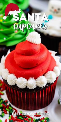 a cupcake with red frosting and white icing