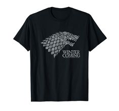 PRICES MAY VARY. Game of Thrones Startk Winter is Coming on Black is 100% authentic, officially licensed Game of Thrones merchandise! (GOT265) Game of Thrones is an American fantasy television series created for HBO. Adapted from fantasy novels by George R. R. Martin, and set in Westeros and Essos, it has a large ensemble cast and follows several story arcs throughout the course of the story. Lightweight, Classic fit, Double-needle sleeve and bottom hem Fandom T-shirt With Logo Print For Fans, Fandom Logo Print T-shirt Fan Merchandise, Fandom Logo Print T-shirt For Fan Merchandise, Fandom Logo Print T-shirt For Fans, Dracarys Shirt, Game Of Thrones Merchandise, Game Of Thrones Winter, George R R Martin, Ensemble Cast