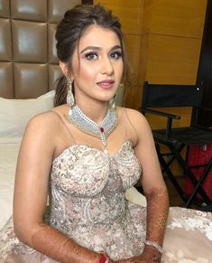 Pony Hairstyles For Gowns, Ponytail Hairstyles On Gown, Reception Hairstyles Ponytail, High Ponytail Hairstyles Wedding Indian, Hairstyle For Chaniya Choli Wedding, Indian Wedding High Ponytail Hairstyles, Engagement Ponytail Hairstyles, Front Pony Hairstyle, Ponytail Hairstyles For Lehenga