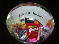 a bucket filled with lots of candy and candies