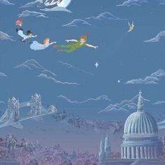 two children flying in the sky over a city