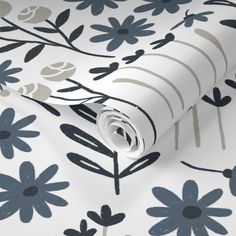 a white and blue floral wallpaper with black flowers on the bottom half of it