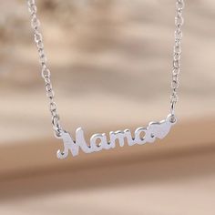 ~Minimalist Silver "Mama" In Script With A Heart Necklace ~18" Cable Chain With 2" Extension & Secure Lobster Claw Clasp ~Silver Plated Light Weight Stainless Steel ~Matching Adjustable Ring Also Available ~Presented In Organza Gift Pouch ~Perfect For Mother's Day ~Please Bundle 2 Or More For Combined Shipping ~Same Day Shipping 1st Class 1-3 Days ~Thank You So Much For Viewing This Item ~Please Shop All My Closet & Boutique Items ~Follow Me For Future Finds Script Necklace, Love Script, Letter Pendant Necklace, Heart Shape Pendant, Gift Pouch, Letter Pendants, Matching Bracelets, Fashion Jewelry Necklaces, Mother Day Gifts