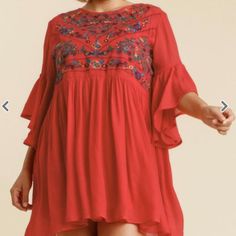 Color Is Not A True Red. Has A Watermelony Coraly Hint To It. Flowers Are Embroidered. Fabric Is Light And Flowy. Perfect For A Beach Vacation This Spring And Summer! Fit Is True To Size. I Have Large Arms And They Still Fit In Sleeves. Fabric Content 70% Rayon, 30% Polyester Model Is 5' 10" And Is Wearing An Xl Casual Red Dress With Floral Embroidery, Casual Red Dresses With Floral Embroidery, Casual Red Mini Dress With Floral Embroidery, Flowy Rayon Dress With Floral Embroidery, Casual Red Embroidered Mini Dress, Red Floral Embroidery Mini Dress For Spring, Casual Red Embroidered Dress, Red Embroidered Fitted Casual Dress, Red Embroidered Casual Fitted Dress