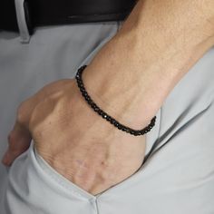 "PLEASE READ FULLY *SIZING INSTRUCTIONS BELOW* This bracelet is made of all genuine faceted 4mm Golden Obsidian and black stainless steel.  It's put together with soft, polyester string with a no-show knot. Obsidian is a protection stone and does its job well.  The main focus behind Obsidian is for its protective nature.  Obsidian obsorbs negative energies, nearly drowning them out.  Obsidian is also used to block psychic attacks. Made with care by me. *Sizing: 1st, measure your wrist with string. Bracelets fit best at least 1/4\" larger than the wrist. IMPORTANT: Bracelets fit smaller than the length specified.  For 10mm bracelets, add 1cm (7/16in). For 8mm bracelets, add 8mm (3/8in) to the size. For 6mm bracelets, add 6mm (3/16in) to the size.  Please feel free to ask me about Sizing.  I Everyday Adjustable Faceted Beaded Bracelets, Everyday Black Jubilee Beaded Bracelets, Everyday Black Jubilee Beaded Bracelet, Adjustable Faceted Beaded Bracelets Minimalist Style, Minimalist Adjustable Faceted Beaded Bracelets, Minimalist Round Bracelet With Faceted Beads, Minimalist Faceted Bracelets, Everyday Faceted Rondelle Bracelets, Everyday Round Faceted Bracelets