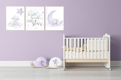 a baby's room with purple walls and white furniture