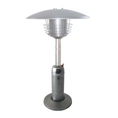 an outdoor table top heater with a brown base and metal cover on the top