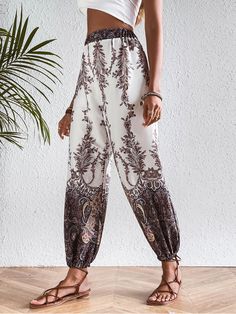 Style: Casual Fit: Loose Fabric: Polyester Pattern: Paisley Element: Non Rise: High Rise Product Type: Pegged Pant Length: Capris & Cropped Main Composition: Polyester Season: Spring/Summer/Fall Bohemian Non-stretch Bottoms With Boho Print, Bohemian Ankle-length Floral Pants, Printed Bohemian Harem Pants For Spring, Bohemian Paisley Print Bottoms For Festival, Bohemian Non-stretch Ankle-length Pants, Bohemian White Printed Bottoms, Bohemian Printed Trousers, Bohemian Spring Pants With Paisley Print, Bohemian Summer Pants With Paisley Print