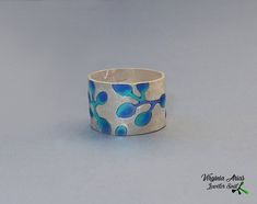 "Silver Enamel Band Ring, Enamel Band Ring, Silver Band Ring, Flower Band Ring, Blue Enamel, Enamel Ring, Handmade Ring, Band Ring, 925 Silver Jewellery. Beautiful Silver Enamel Band Ring made of sterling silver and enamels. This handmade silver ring is a special flower design on a silver band. The band ring is perfect to wear everyday. Details: Weight: 5.7 g Band Width: 12 mm = 0.47\" Diameter- size: 6 US available. Other sizes: Please select your Ring size and I would customize it for you. Enj Luxury Unique Enamel Ring In Sterling Silver, Cheap Adjustable Silver Enamel Ring, Luxury Handmade Silver Enamel Ring, Cheap Blue Enamel Jewelry, Affordable Silver Enamel Ring For Gift, Luxury Blue Enamel Ring As Gift, Cloisonne Jewelry, Flower Band, Ring Flower