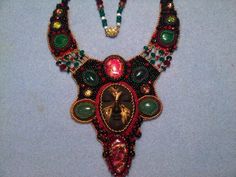 My all time favorite I have done. Face carefully crafted by Diane Briegleb. Beading by Niki Myers-Rogerson Dichoric cabs by Karen Brown. Embroidered Art, Beaded Jewellery, Bead Embroidery, Beaded Necklaces, Jewelry Ideas, Jewelry Inspiration