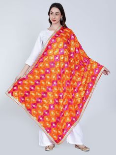 This light weight Red and Gold phulkari dupatta for women by Moda Chales is an exemplary item that are must haves in every women's wardrobe. Ethnic Punjabi handwork, and soft feel add the perfect finishing touch to almost any outfit. It is the ideal fashion accessory for any season, event or occasion! It is lightweight, super soft and easy to carry. 💡 Material- Chiffon 💡 Pattern - Embroidered 💡 Type of Work - Phulkari / Fulkari 🥻 Multicolor Phulkari chunni for Women (Magenta and Orange) 💡 Free Size Dupatta that is approx. 2.25 Meters- 2.30 Meters Long and 44 inches wide 💡 Also Called as Bridal Dupatta, fulkari dupatta, handmade phulkari dupatta 💡 Dry Clean Recommended 🎁 Gift Wrap Possible 🎁 Free Shipping and Express Shipping Also Available 🎁 Shipped from Amritsar, Punjab ( India Multi Dupatta, Magenta And Orange, Indian Dupatta, Bridal Dupatta, Phulkari Dupatta, Amritsar, Embroidery Techniques, Style Expert, Women's Wardrobe