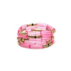 Features: *NEW CUSTOM DESIGN* 4mm translucent rosie pink curved acrylic beads 4mm 14k gold plated Indian discs 4mm Black rubber beads 7-inch elastic stretch band one size fits most Adjustable Pink Beaded Bracelets With Gold Beads, Adjustable Stackable Pink Stretch Bracelet, Pink Plastic Beaded Bracelets For Party, Pink Stackable Beaded Bracelets For Party, Flexible Pink Beaded Bracelet, Flexible Pink Beaded Bracelets, Pink Stackable Stretch Bracelet With Round Beads, Pink Beaded Bracelets With Gold Beads For Party, Party Pink Beaded Bracelets With Gold Beads