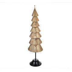 a wooden christmas tree on a black stand