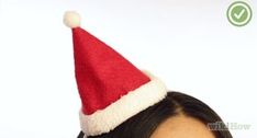 a woman with a santa hat on her head