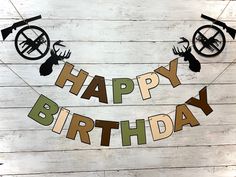 a happy birthday banner with deer heads on it