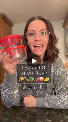 a woman is holding up a sign that says lazy girl meal prep