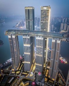 an aerial view of some very tall buildings